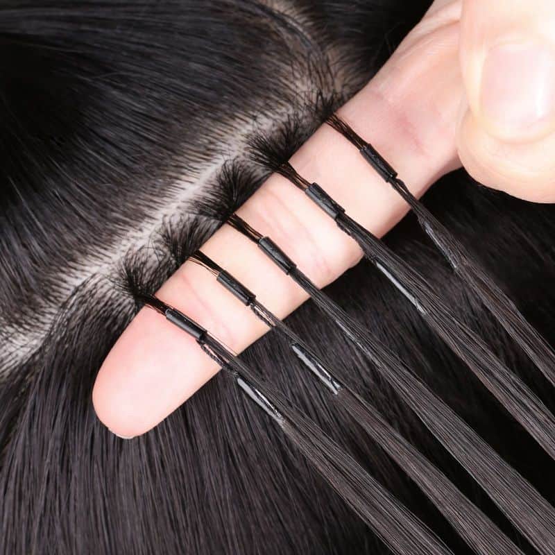 Extensions cheveux 6D, comment s'y retrouver ? 5 Extensions cheveux 6D deuxieme generation image de pose sur tete
